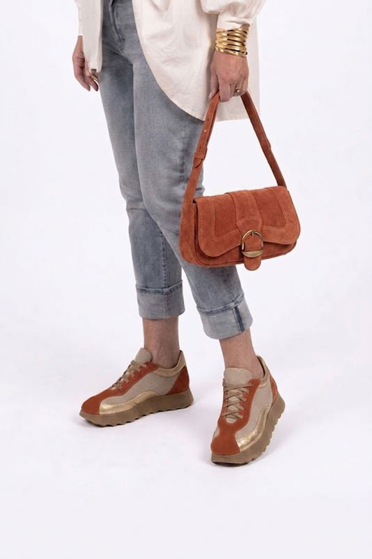 Dress sneakers in terracotta orange and gold leather with thick rubber soles and round toe - Worn view